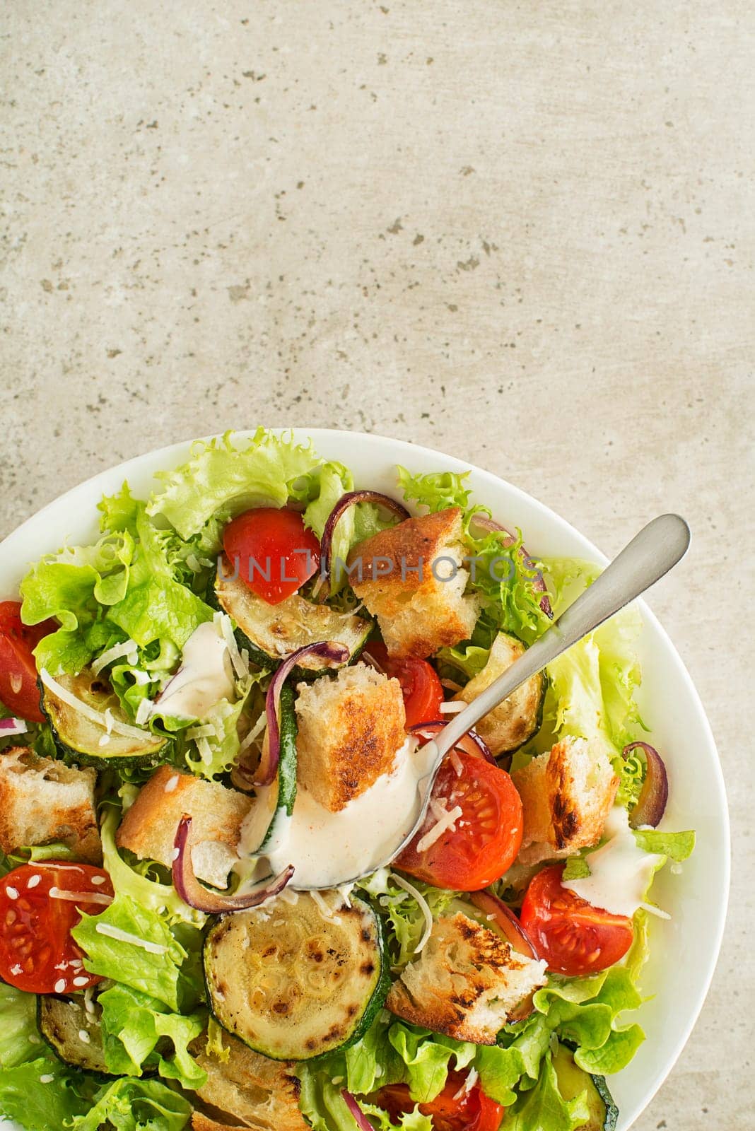 Eating Healthy vegetarian meal with roasted bread, vegetables and sauce on grey background. Healthy lunch bowl