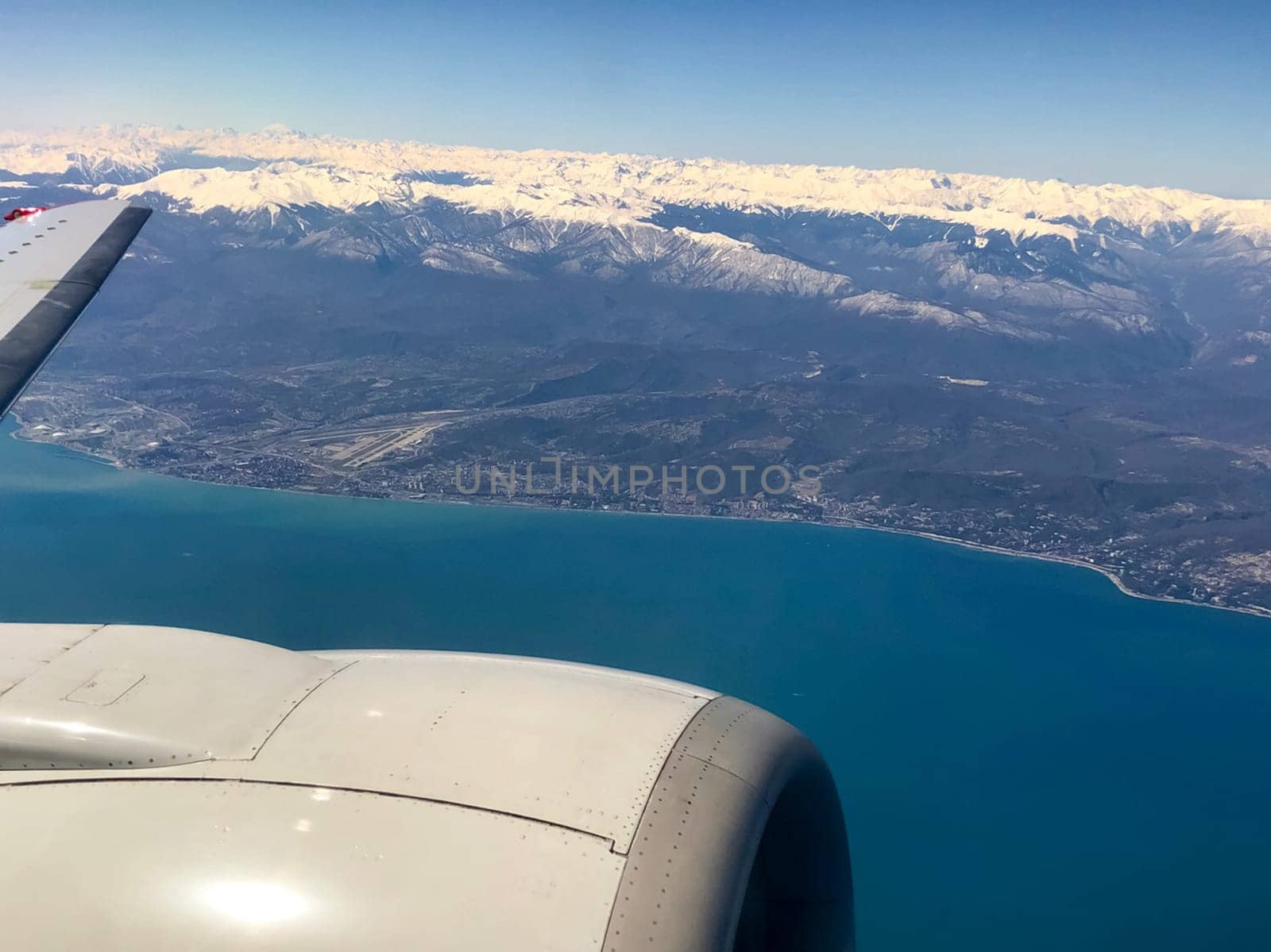 View from the plane on the coast and mountains.
