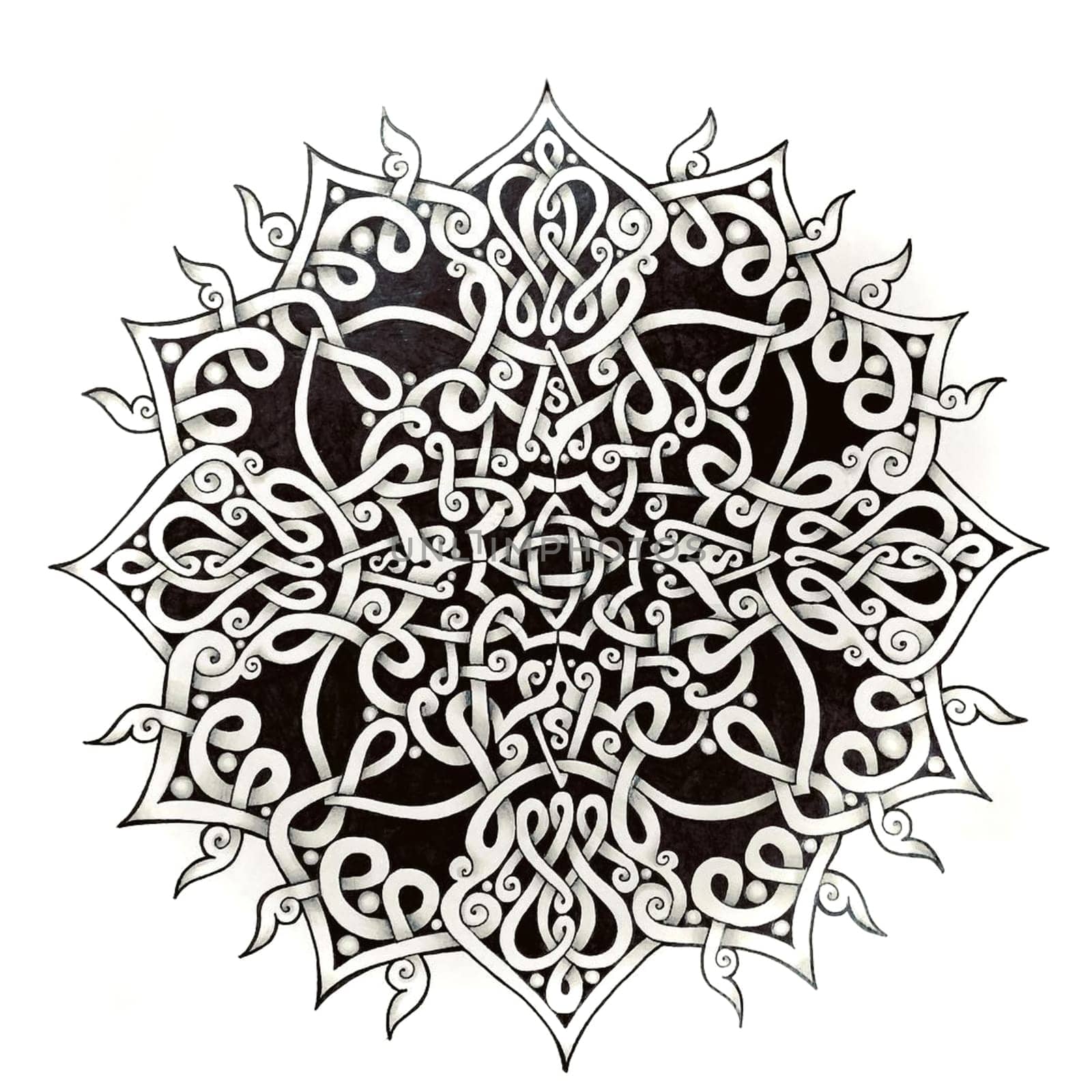 Painted ink on paper circle with patterns.