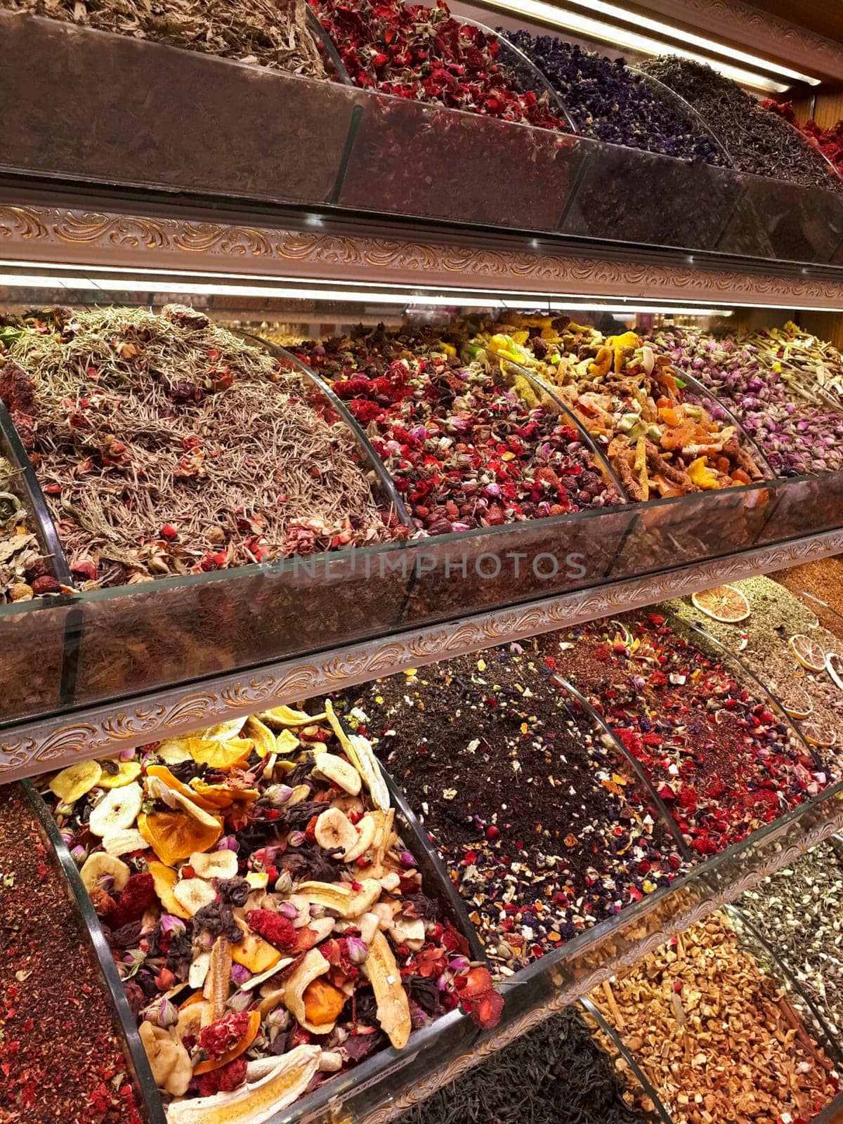 Spices on the counter in the store. A large set of different spices.