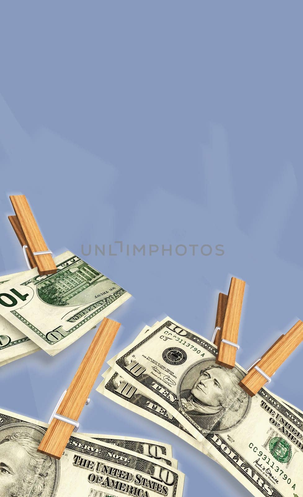 Ten dollar bills clipped with clothespins
