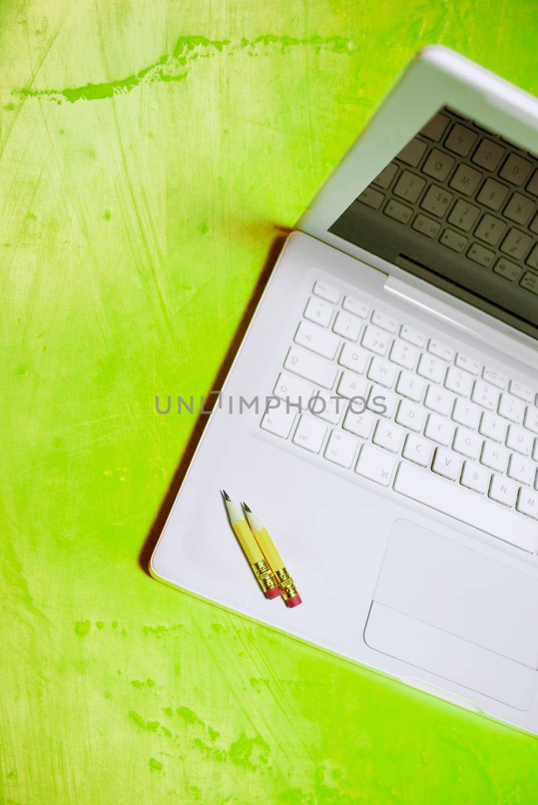 Close_up of pencils on a laptop