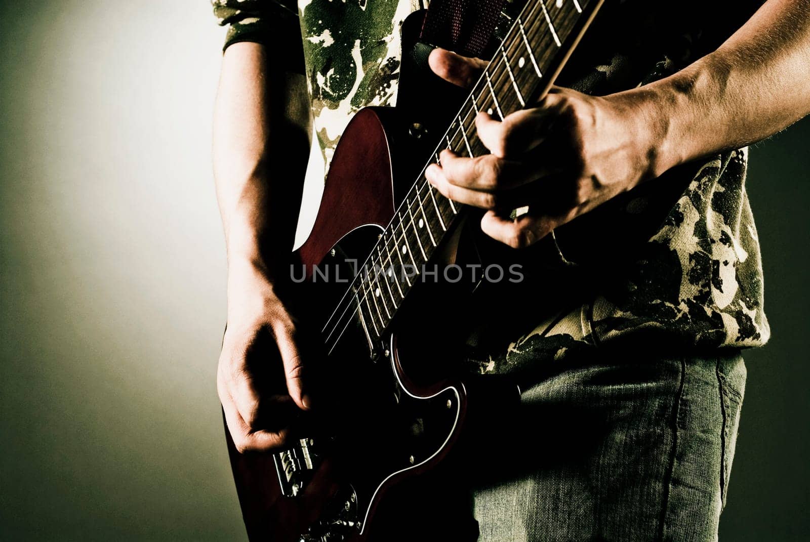 Man playing a guitar