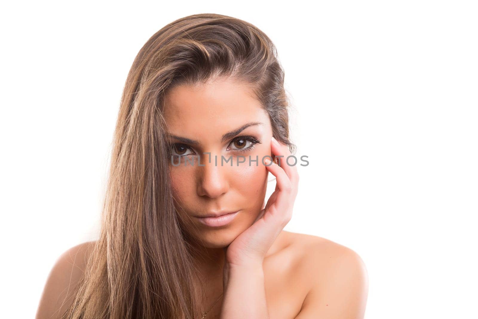 Beautiful woman with perfect skin posing over white