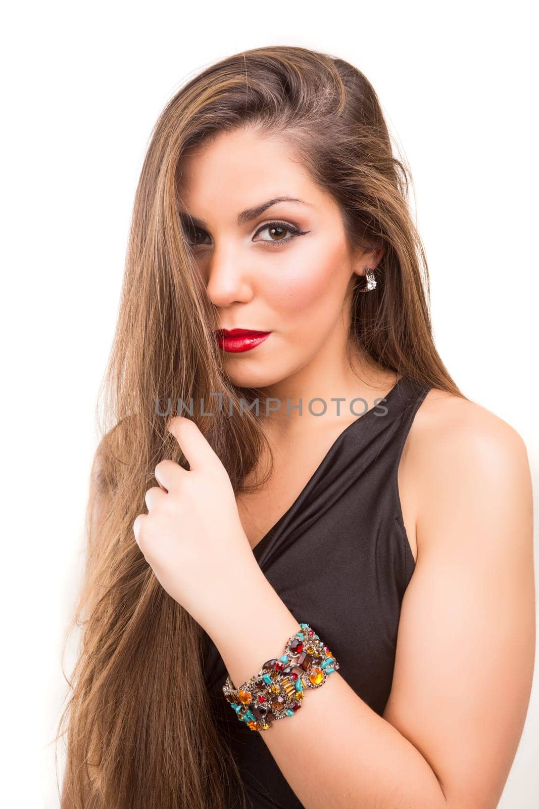 Beautiful Brunette Girl with healthy long hair - isolated over white