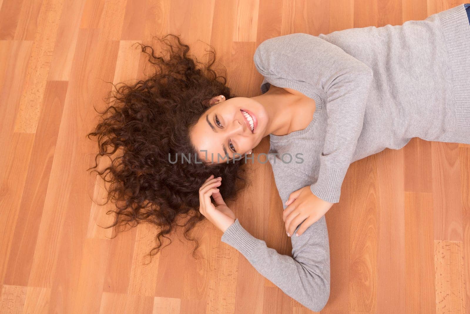 Happy woman relaxing in her new house