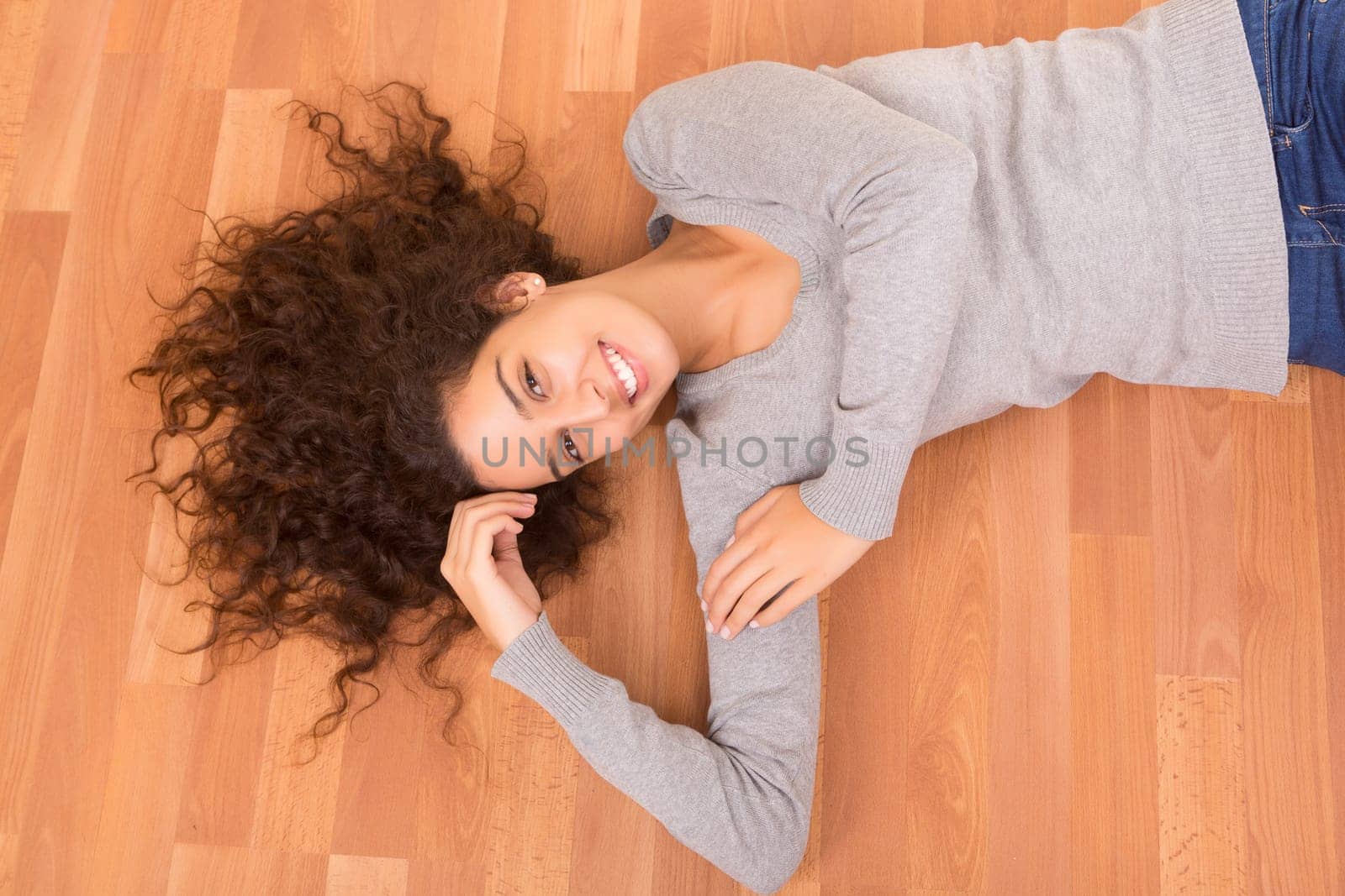 Happy woman relaxing in her new house