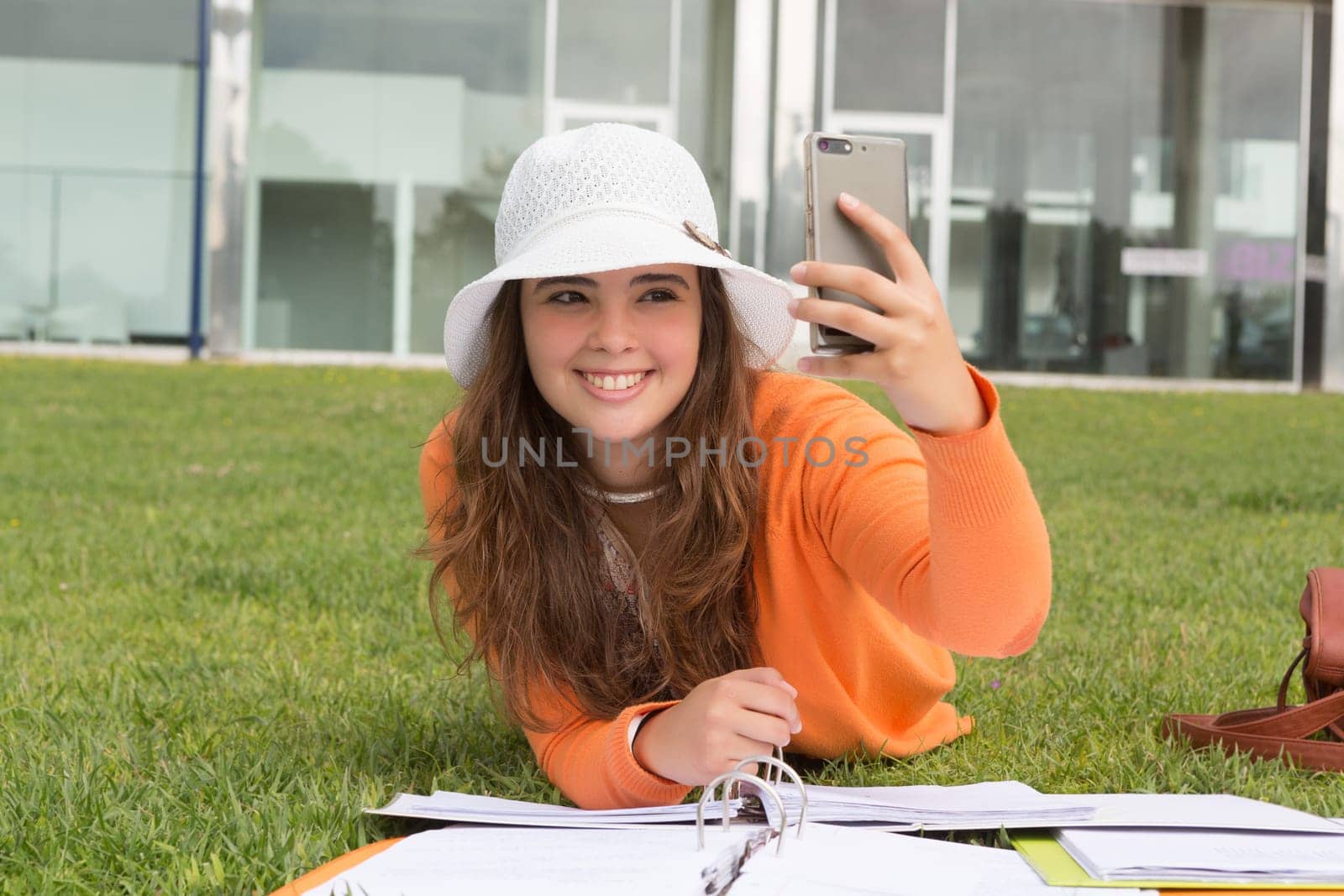 Young woman studying at the university campus