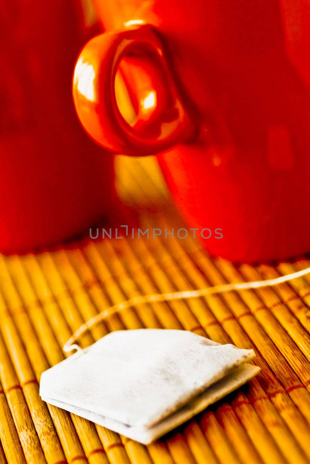 Close_up of tea cups and a teabag