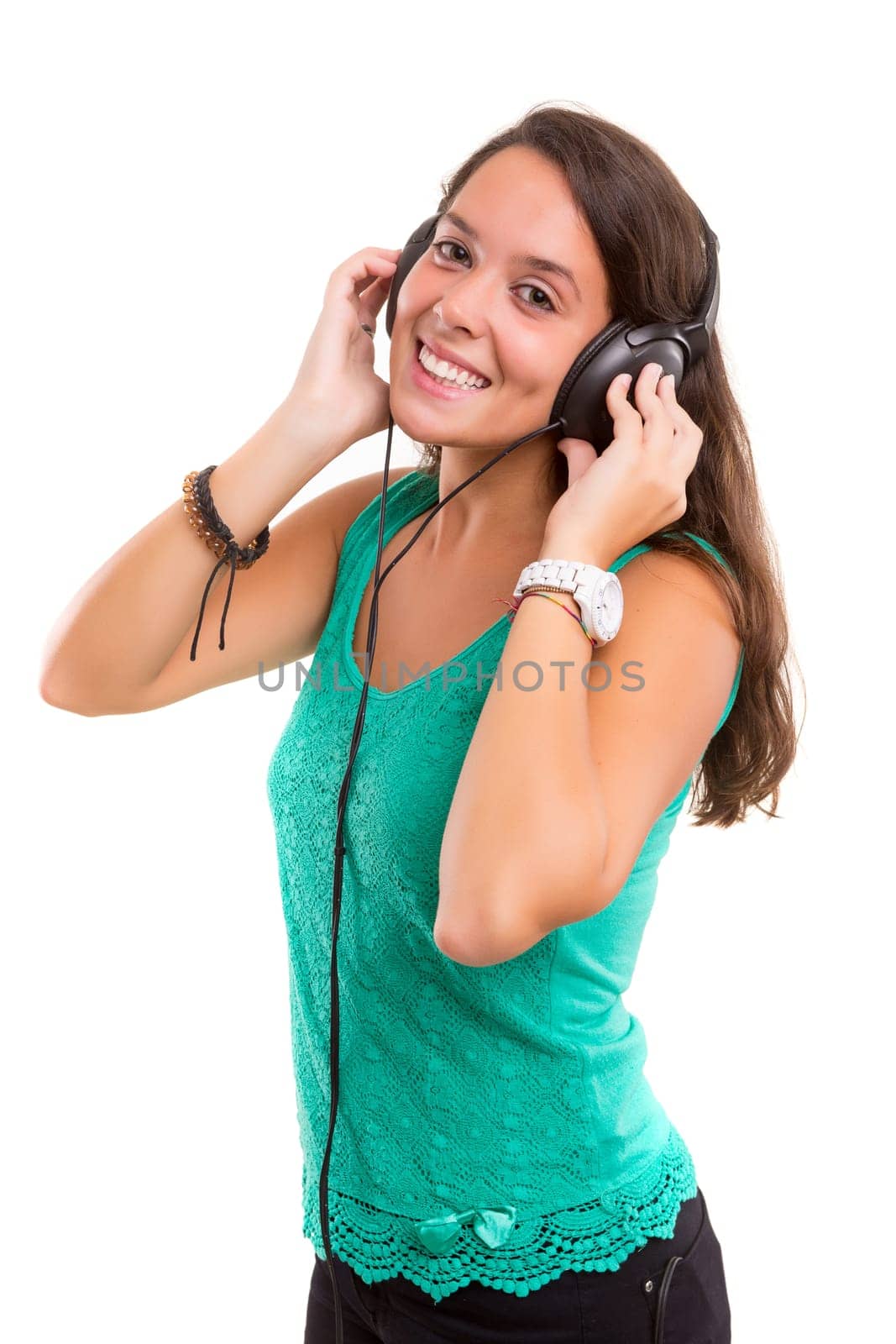 A Happy young woman listening to music