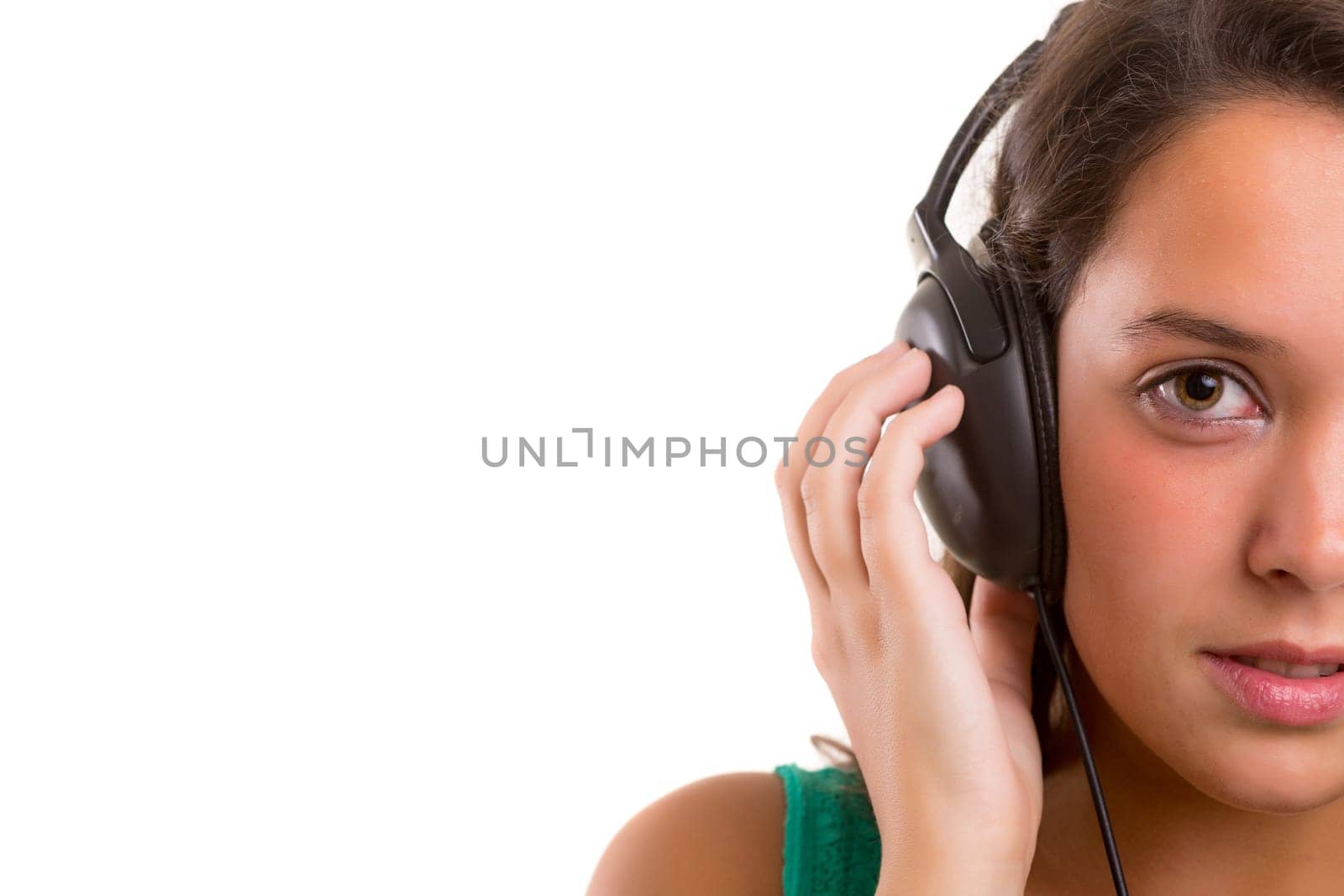 A Happy young woman listening to music