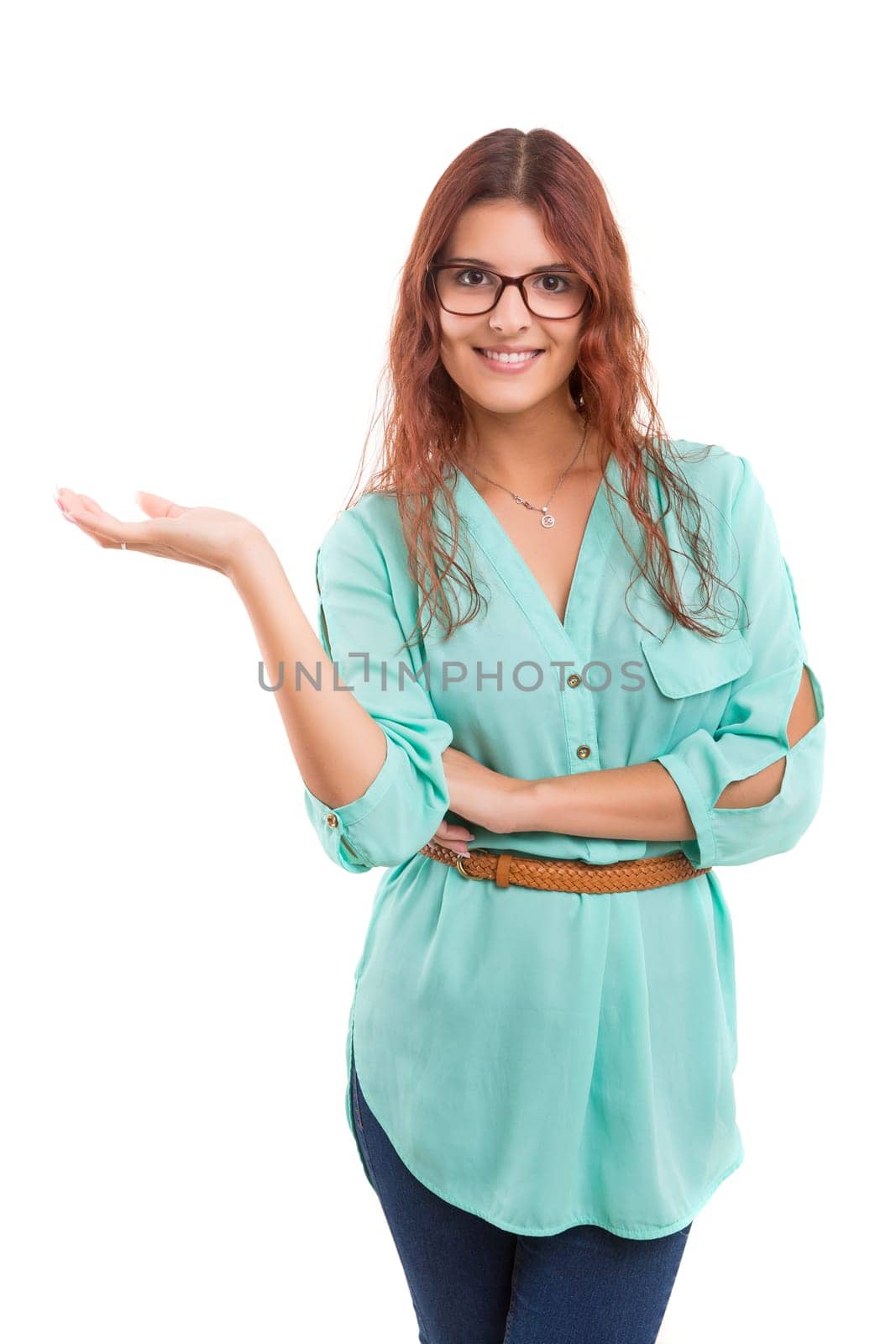 Young beautiful woman presenting your product, isolated over white background