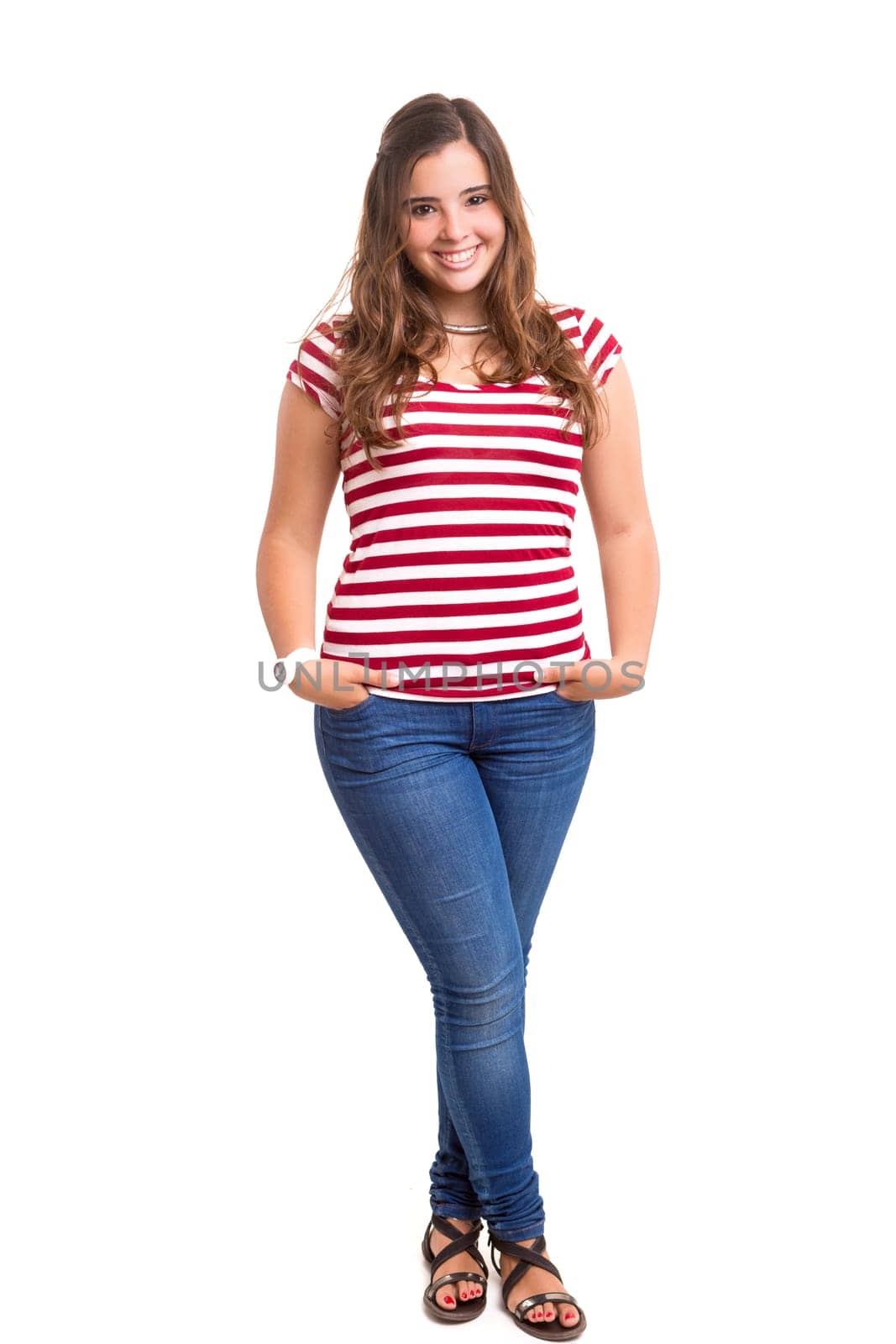 Beautiful young woman posing isolated over white background