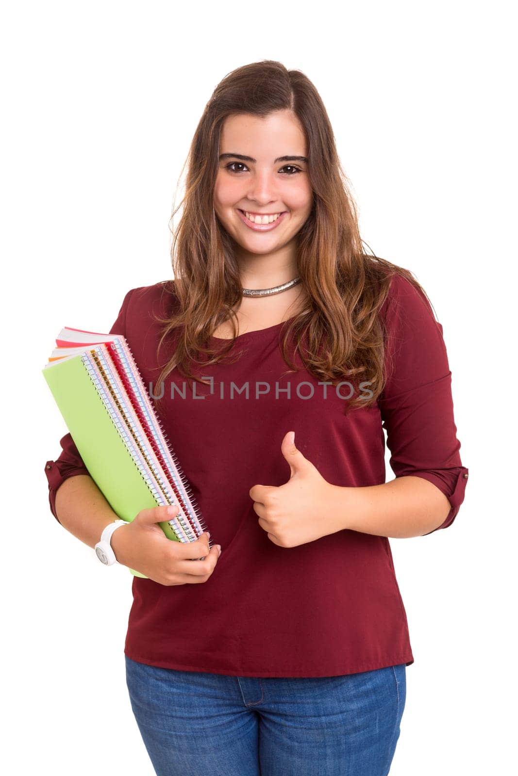 Young student woman posing over white background