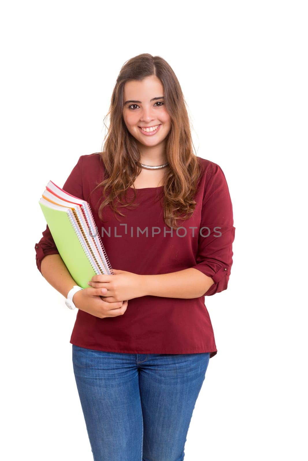 Young student woman posing over white background