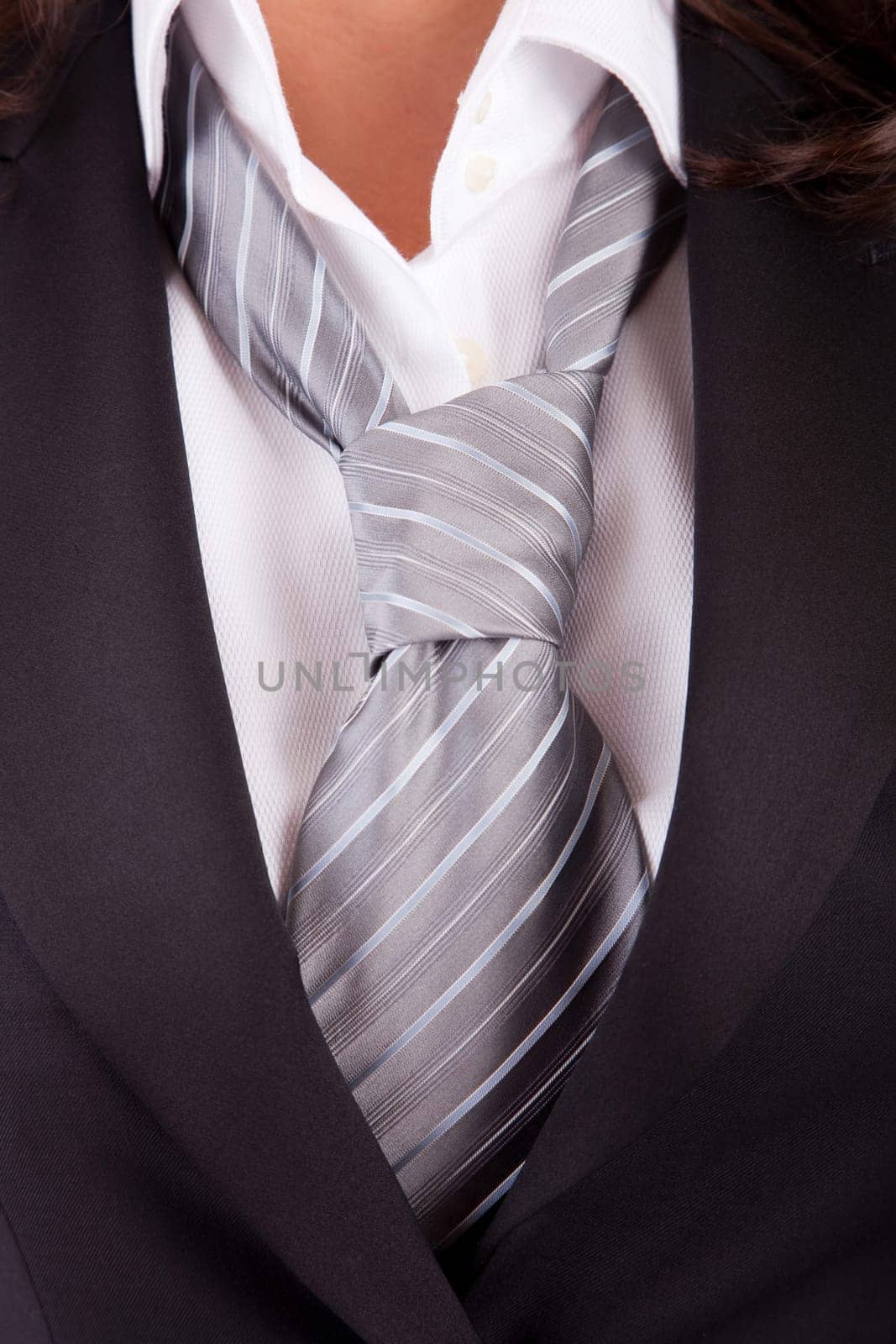 Detail of woman's suit and tie