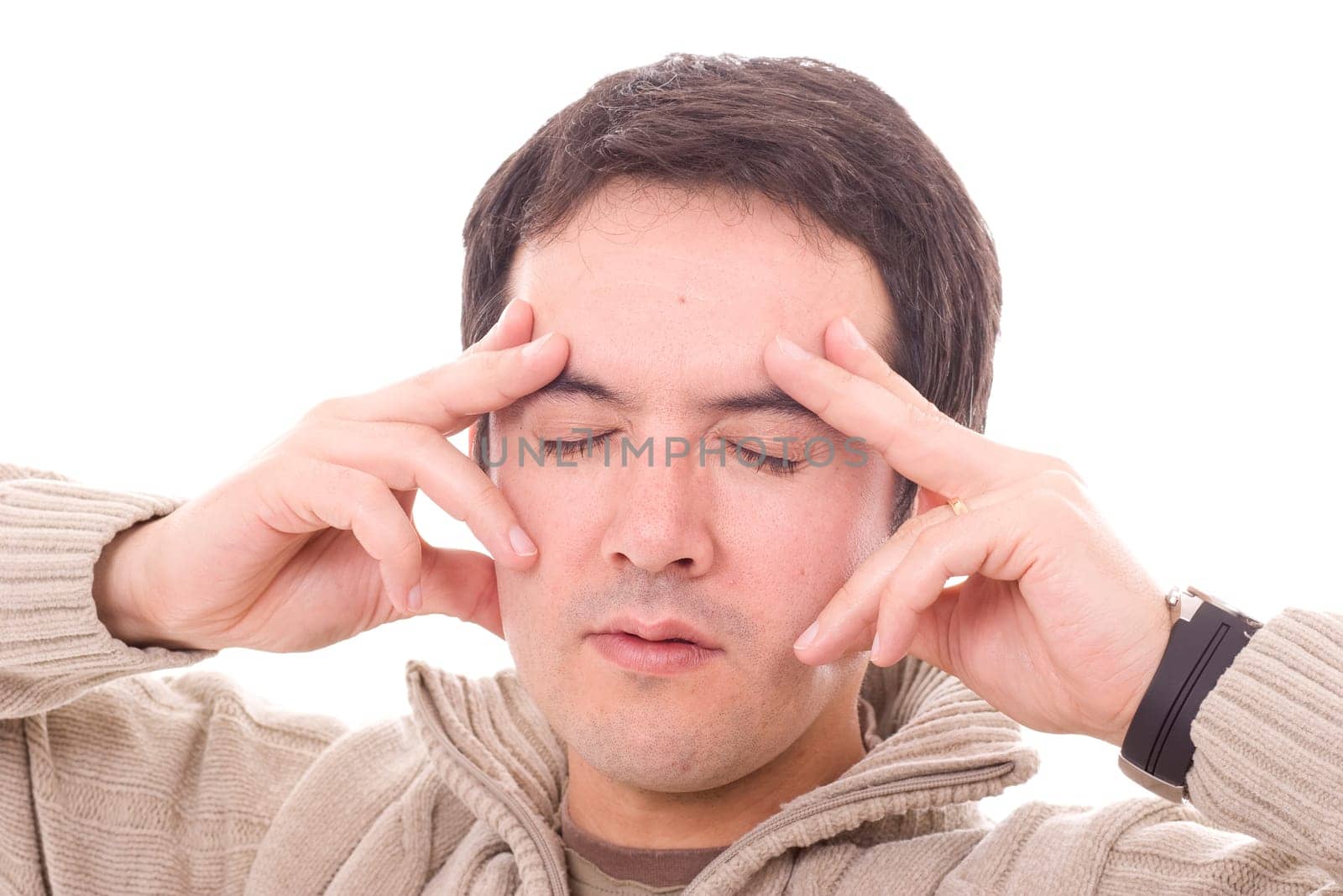 young man with headache, isolated in white background