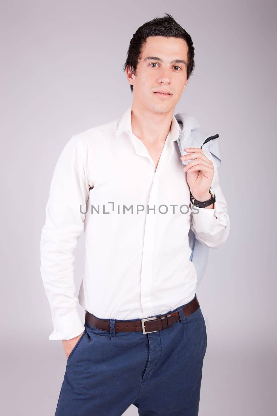 Young casual boy posing isolated