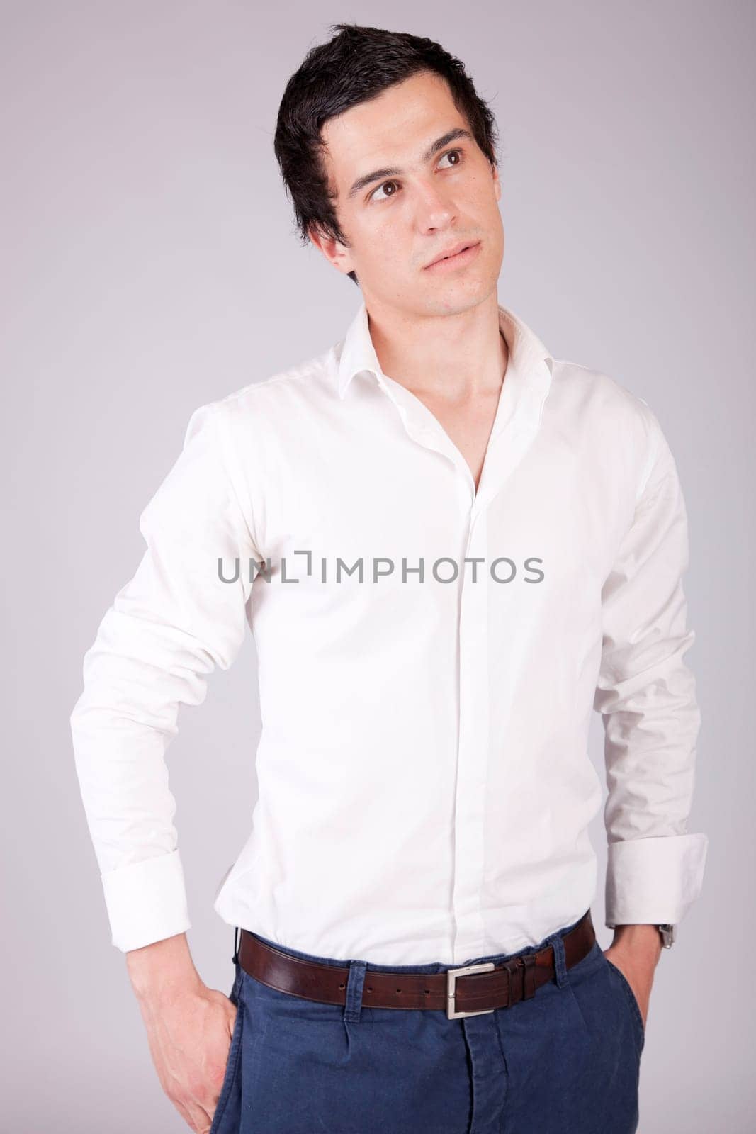 Young casual boy posing isolated