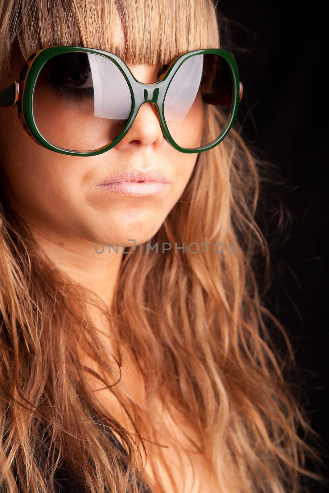 Low Key Portrait - Woman in sunglasses
