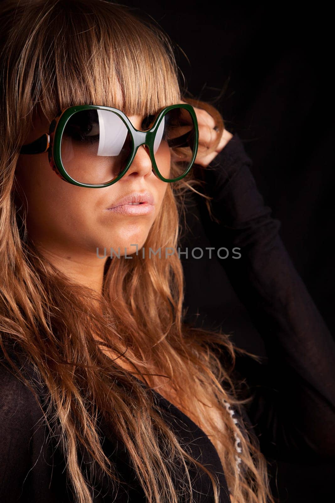 Low Key Portrait - Woman in sunglasses