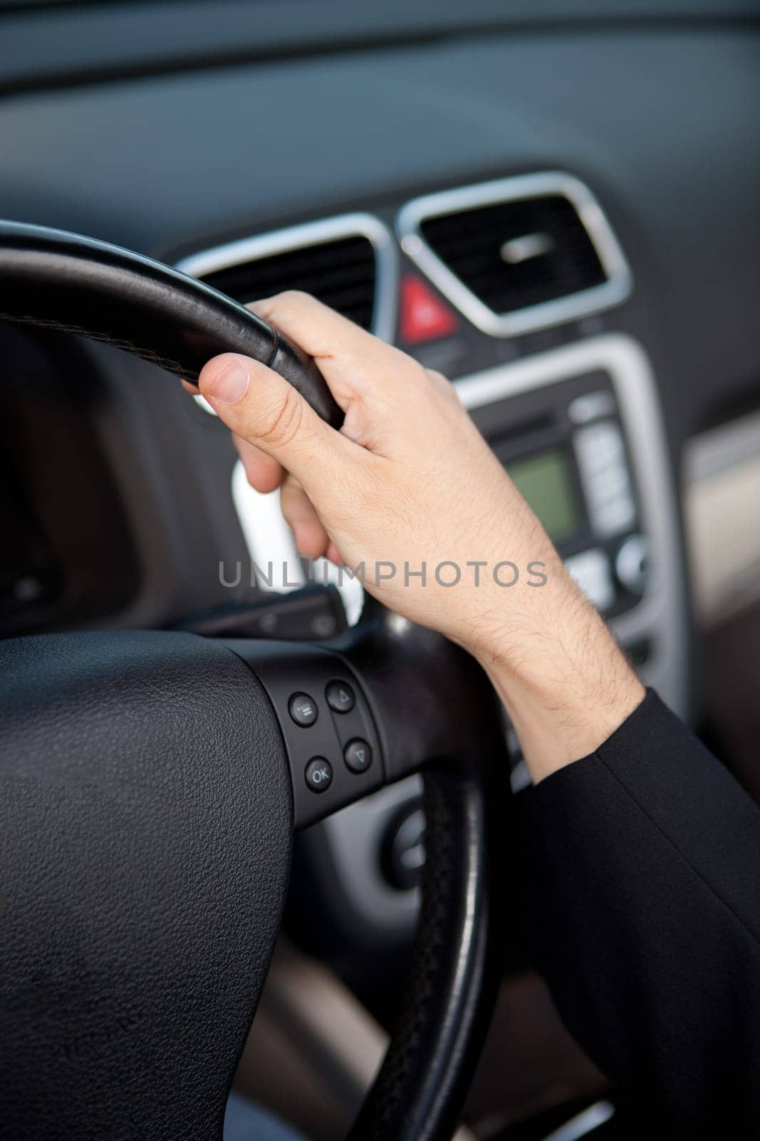 Young man in luxury sports car