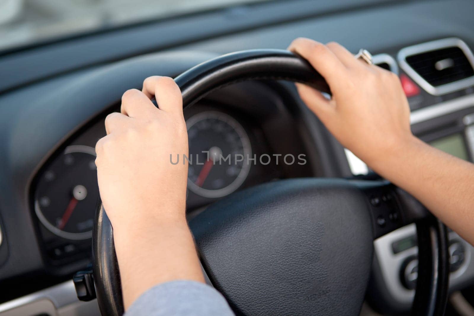 Young woman in luxury sports car