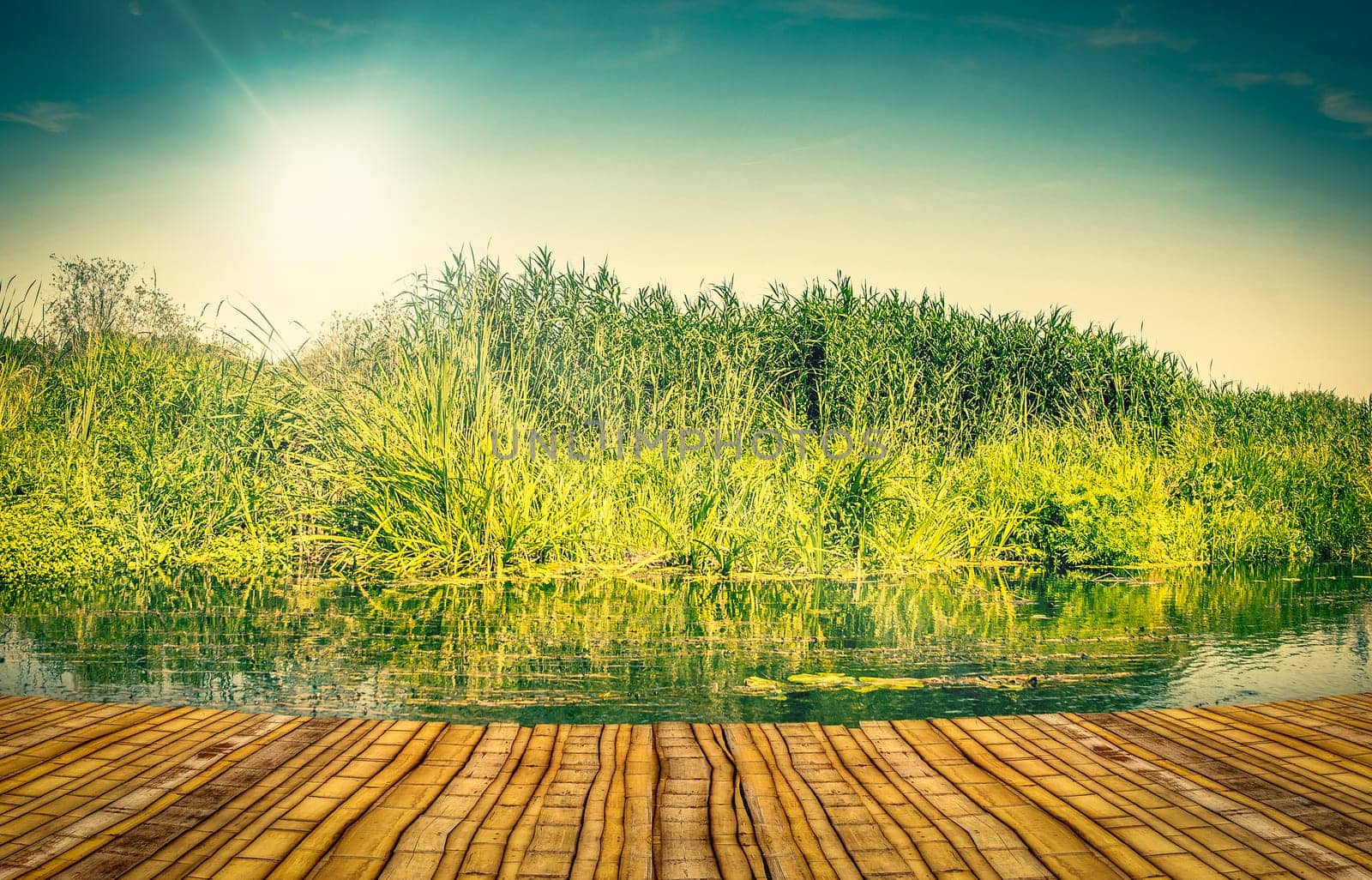 Colourful lake landscape with a bamboo pier