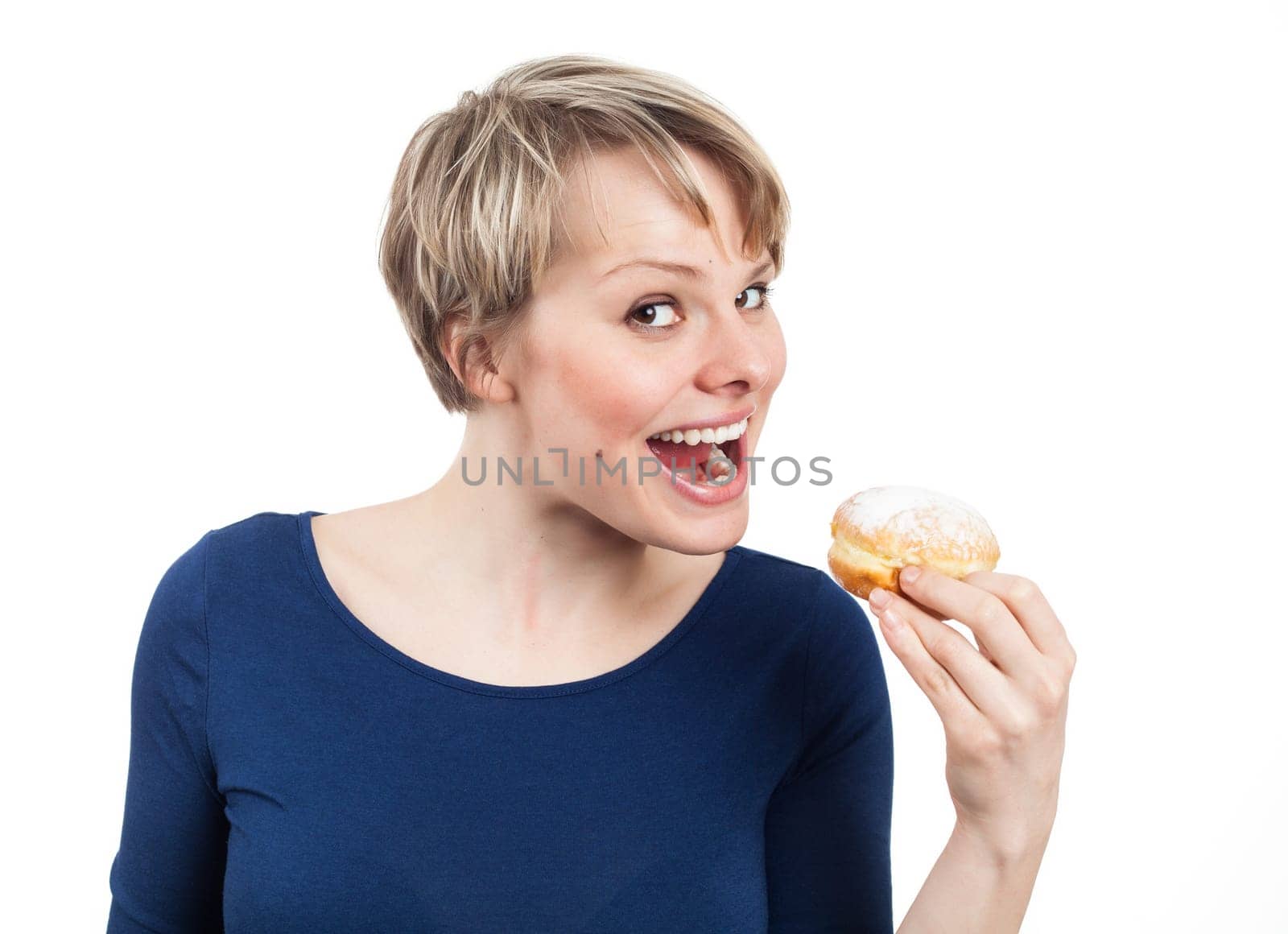 Funny woman about eating a donut, isolated on white