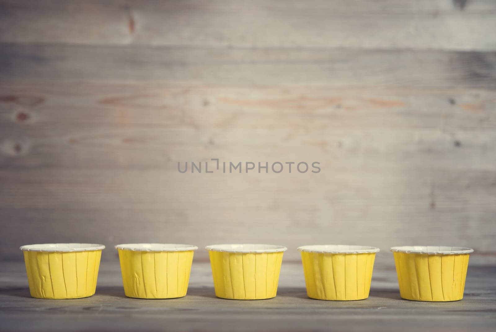 Paper muffin cups isolated on white background