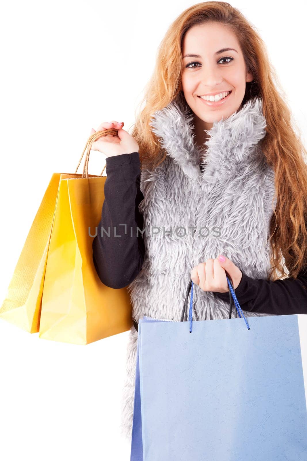 Young and beautiful woman with shopping bags