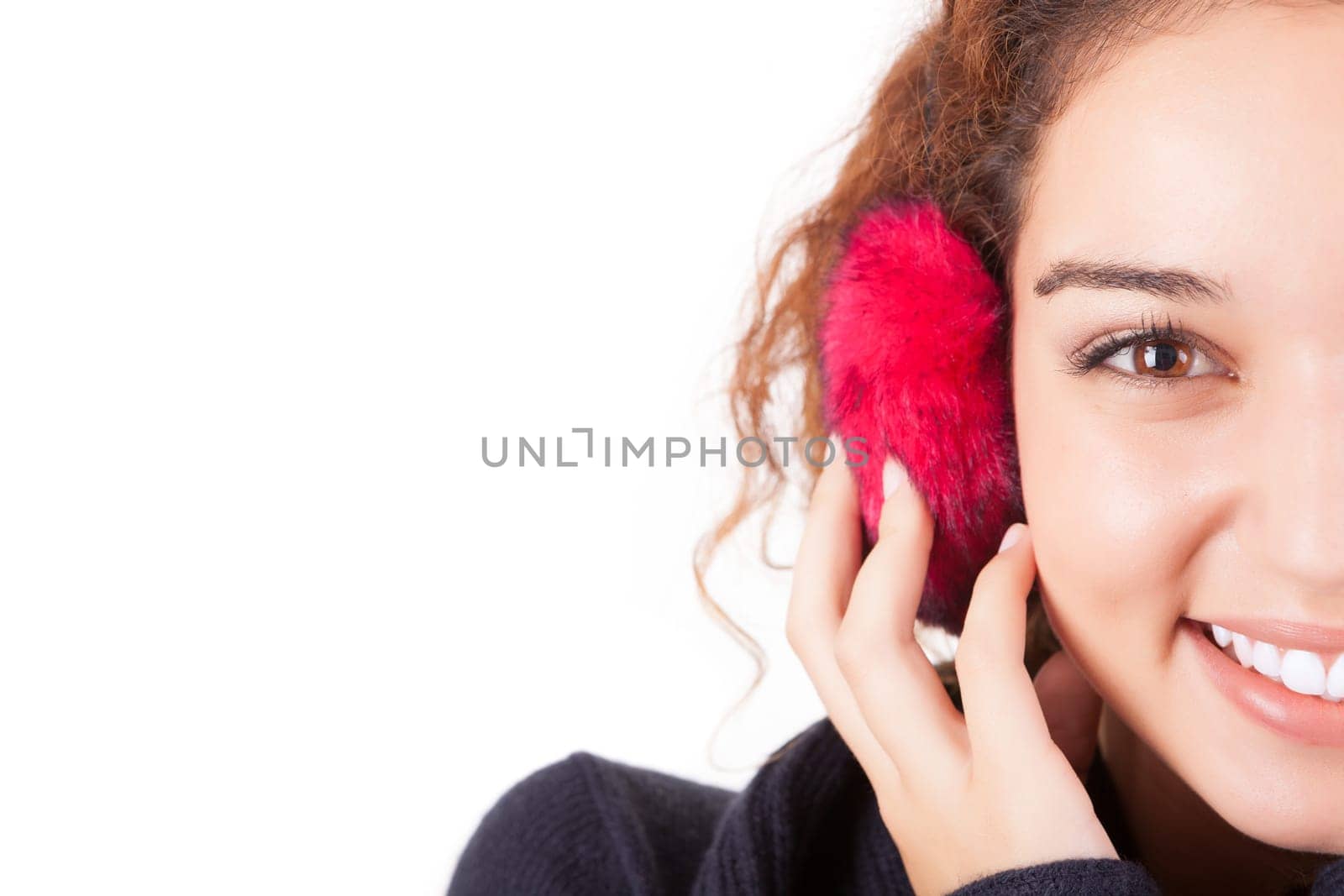 A beautiful young woman dressed for winter