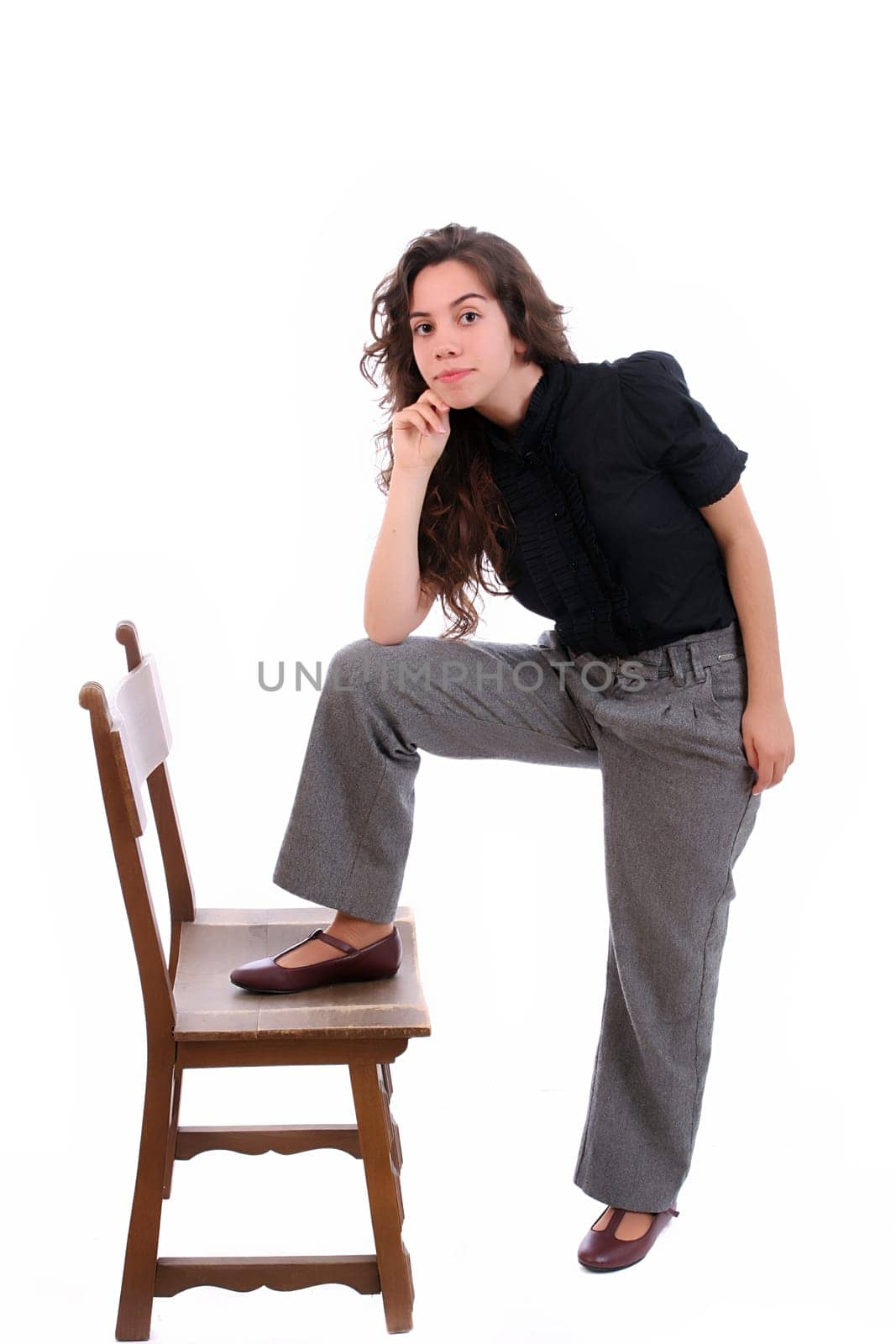 Young girl posing, isolated over white background