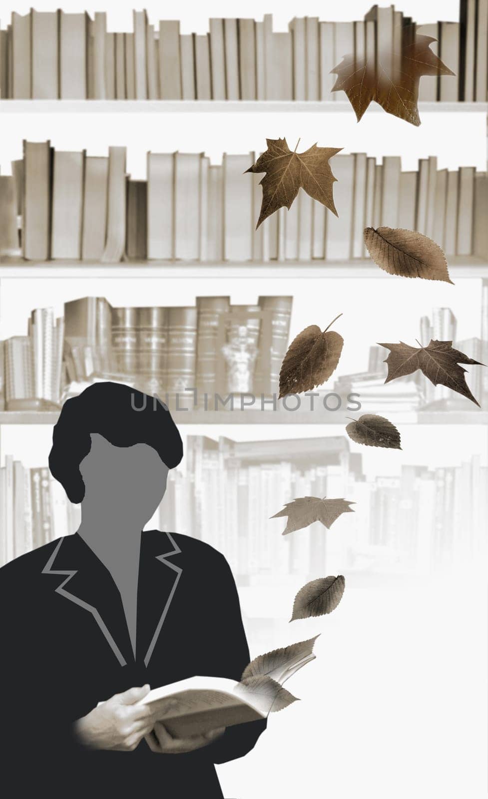 Woman holding an open book with dry leaves