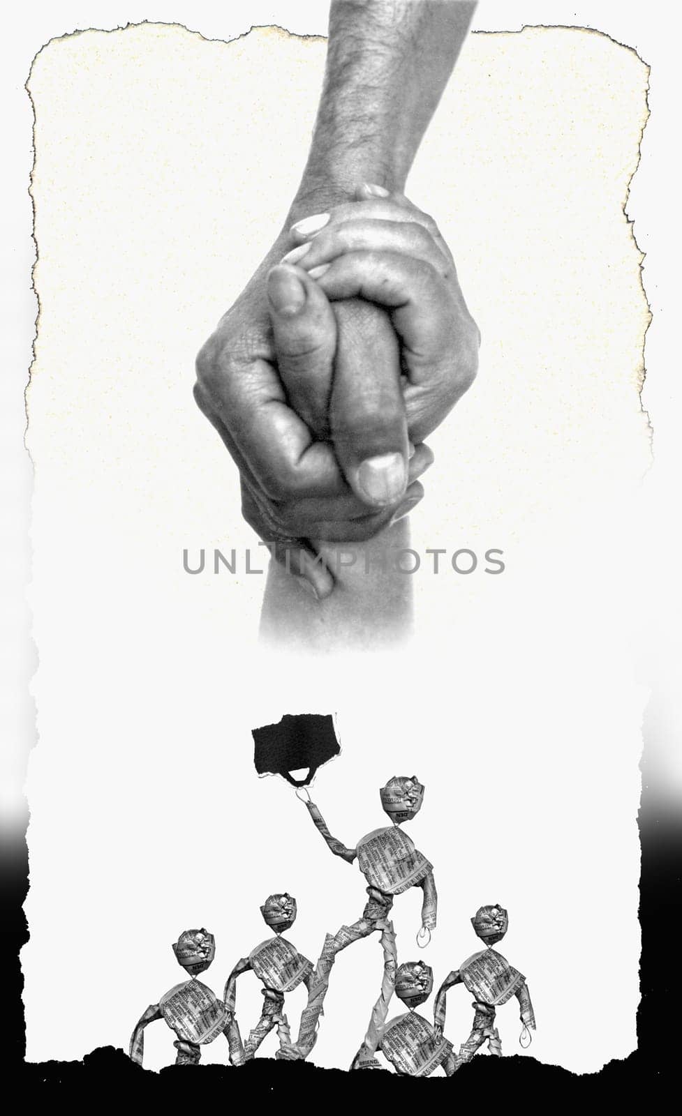 Two people arm wrestling with newspaper figurines below