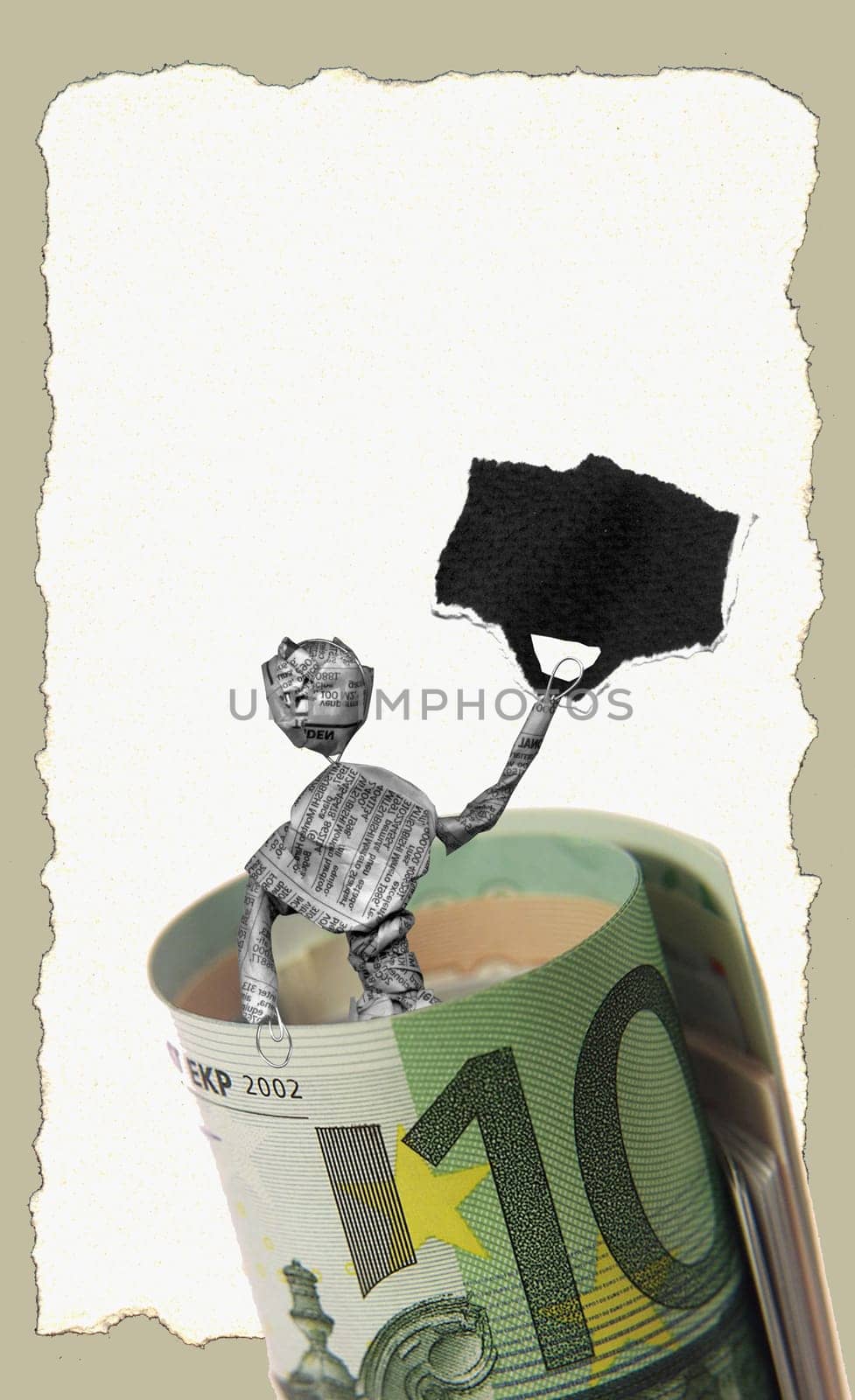 Figurine of a man in a roll of money