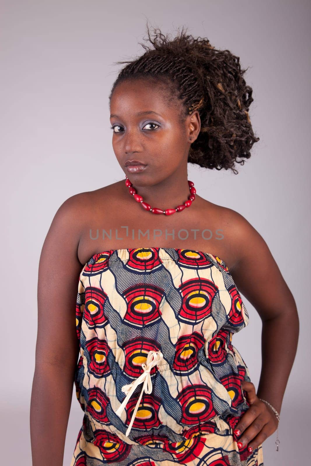 Young and beautiful woman posing - isolated