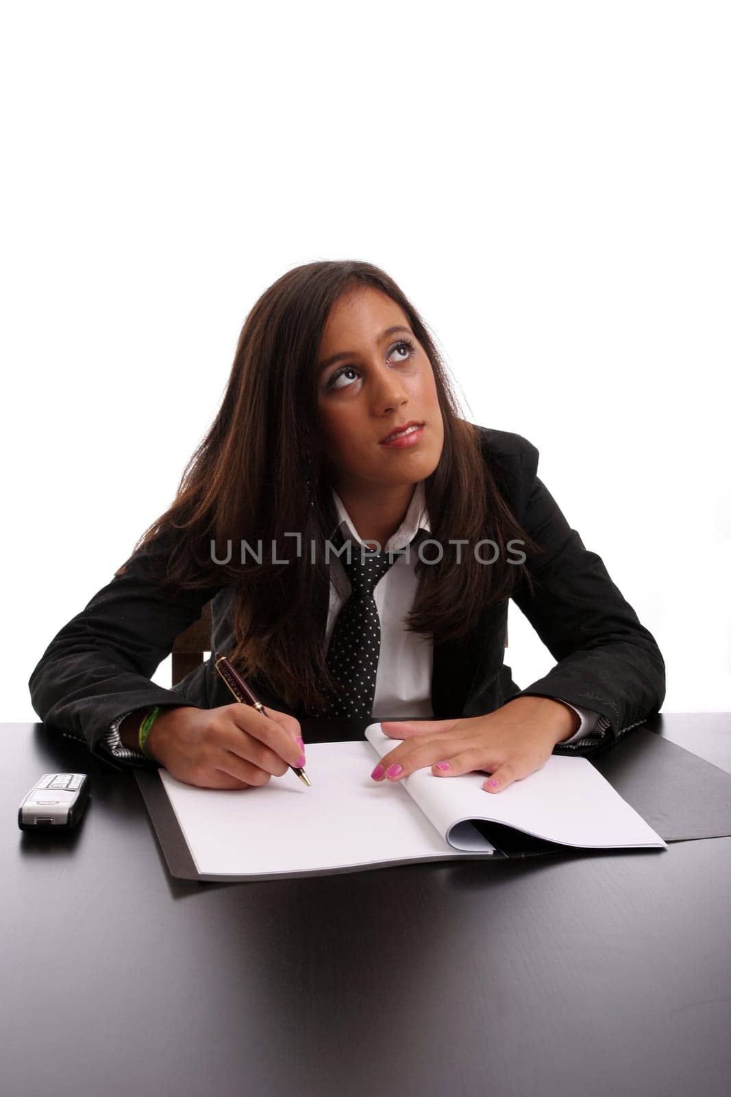 Young businesswoman at work, isolated over white