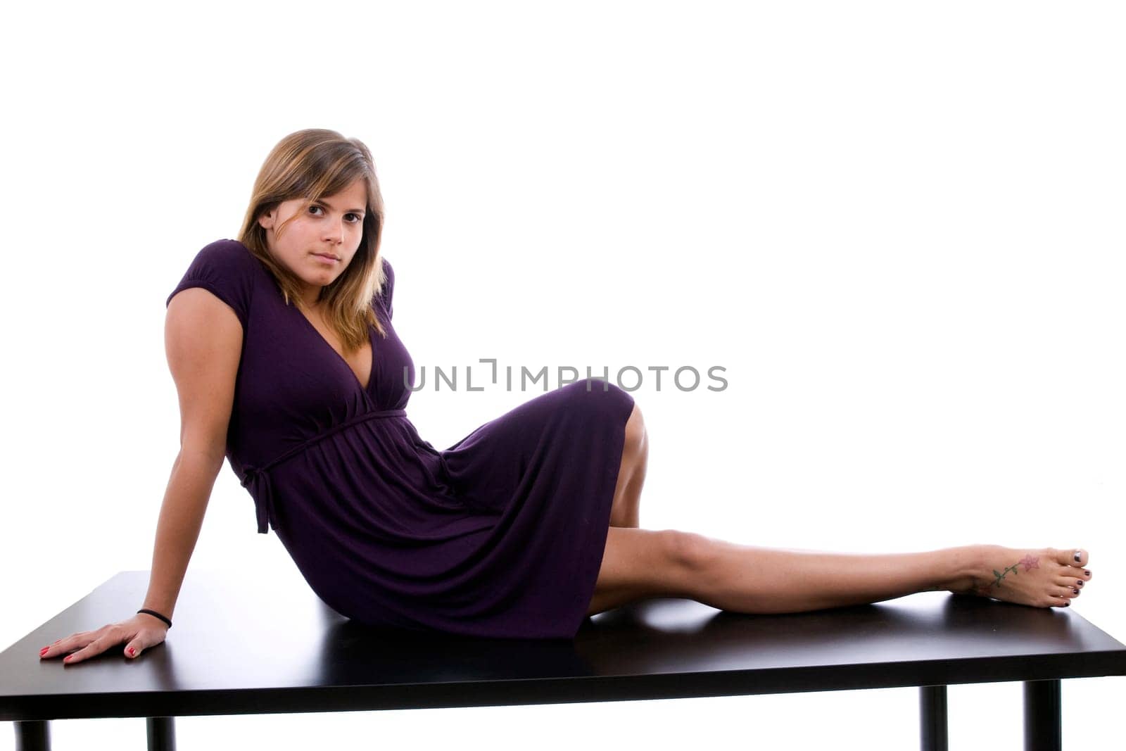 Beautiful Girl posing isolated over white background
