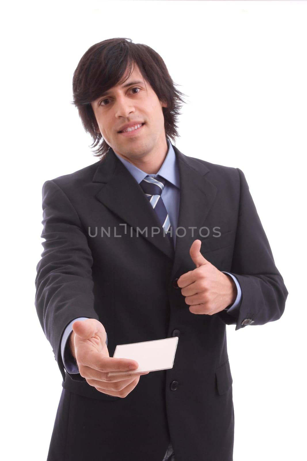 businessman offering businesscard over white background - focus on card