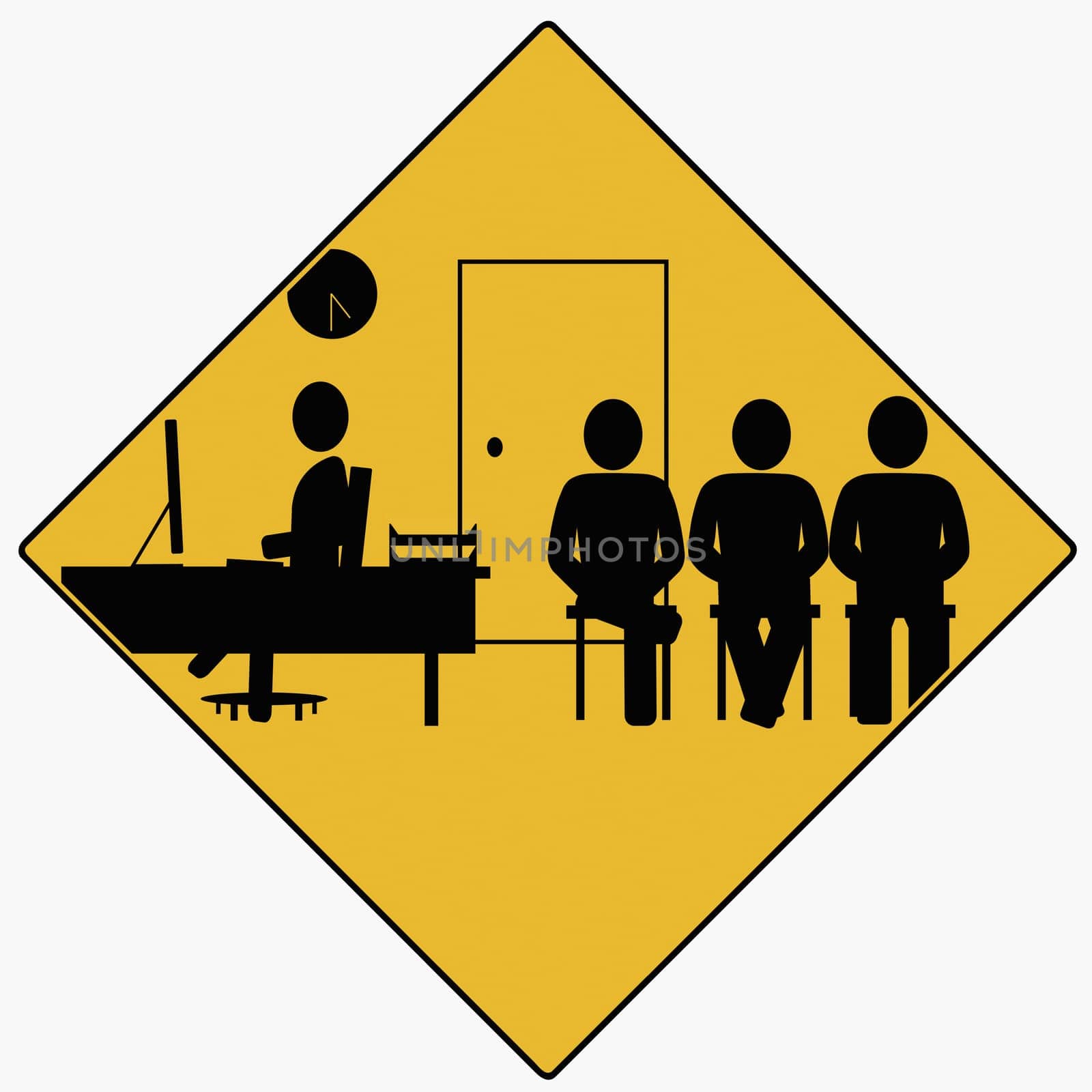 Businessman using a computer with others beside him