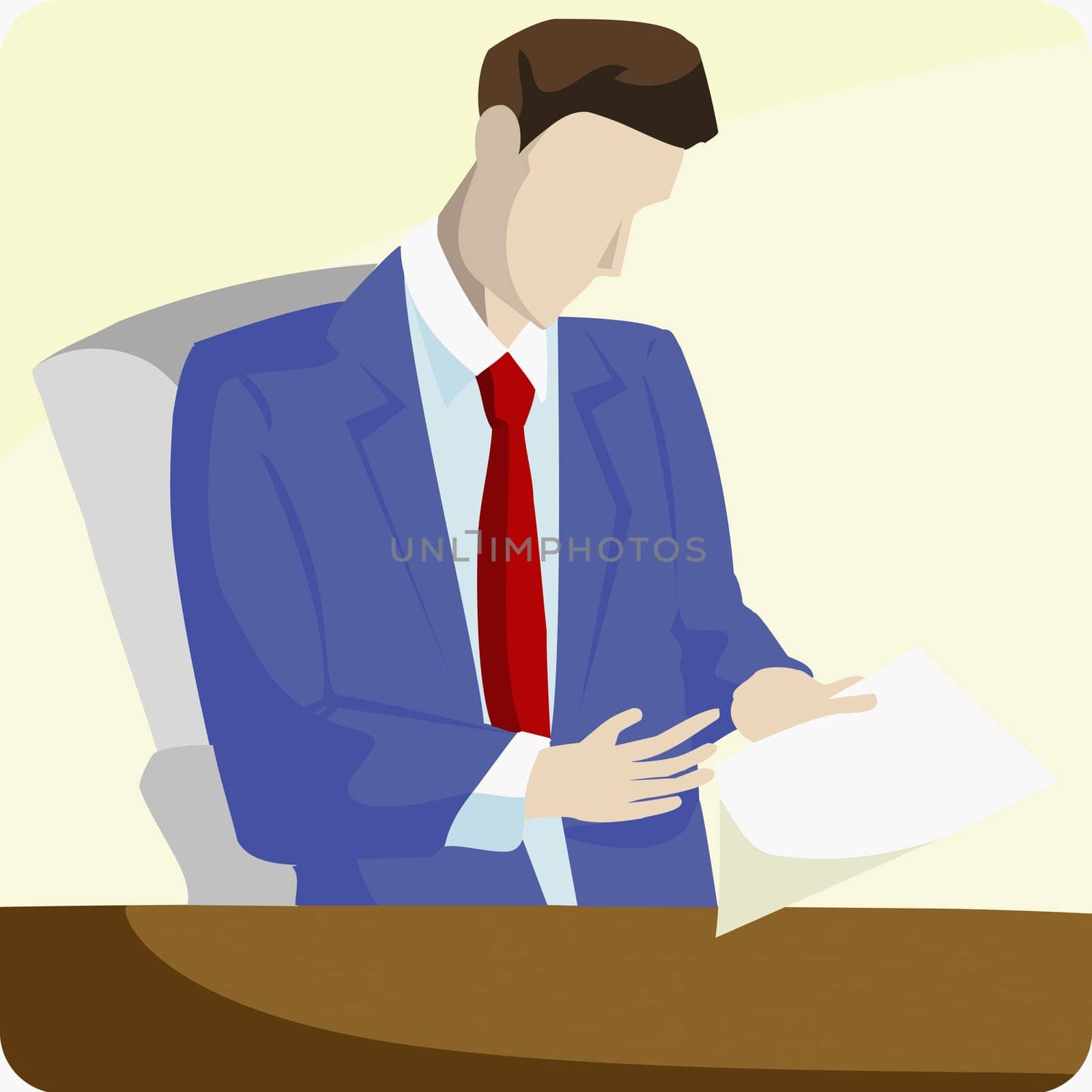 Businessman sitting in an office and reading a document