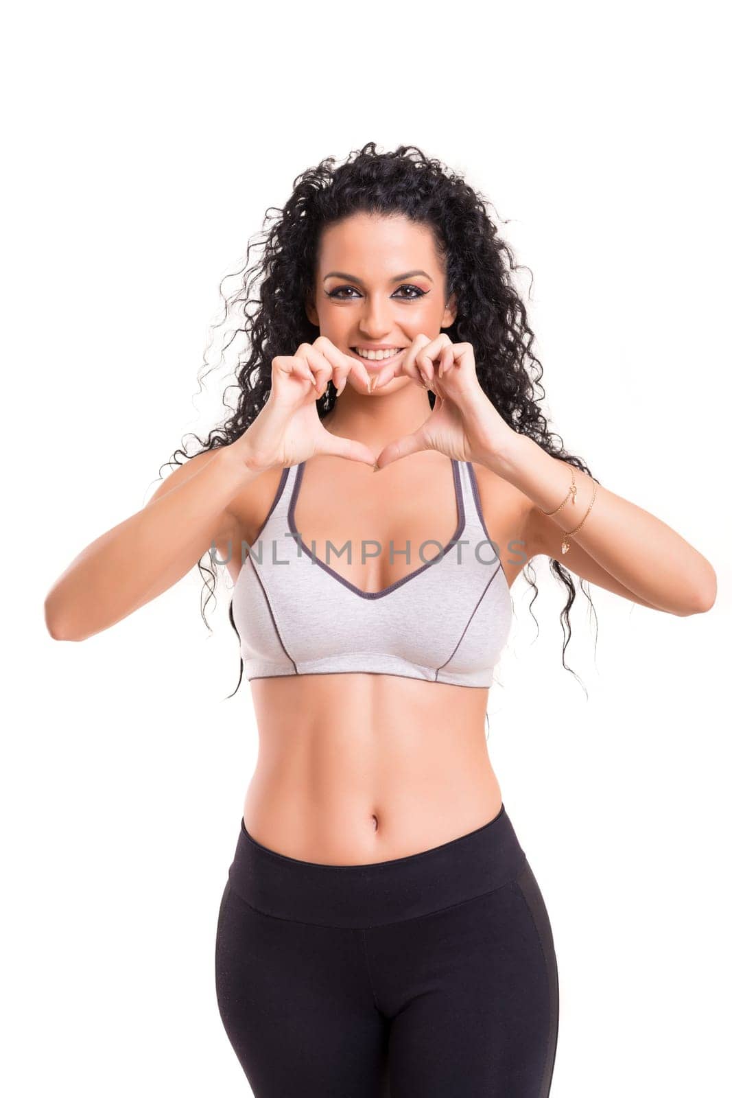 A beautiful young woman exercising - fitness concept