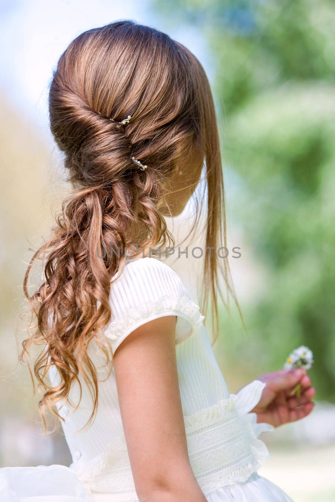 Close up detail of french twist and permanent wave hairstyle.