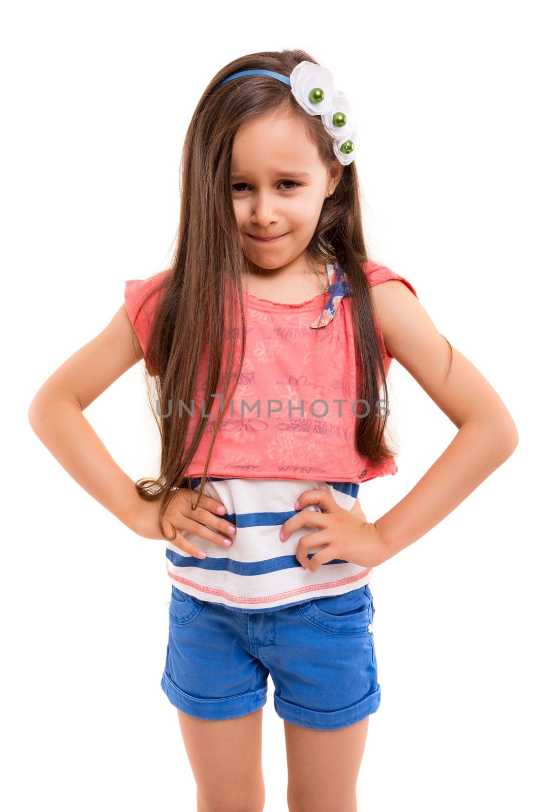 Studio shot of a mad young girl - isolated over white