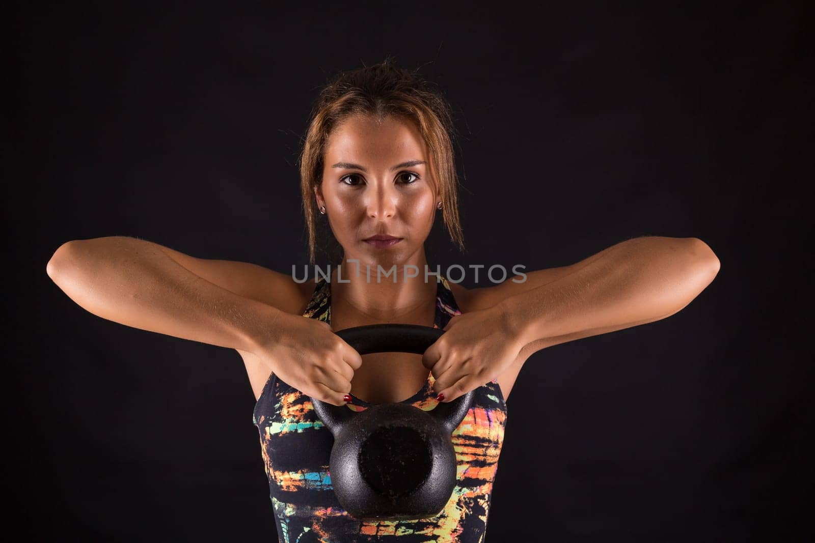 A beautiful young woman exercising - fitness concept