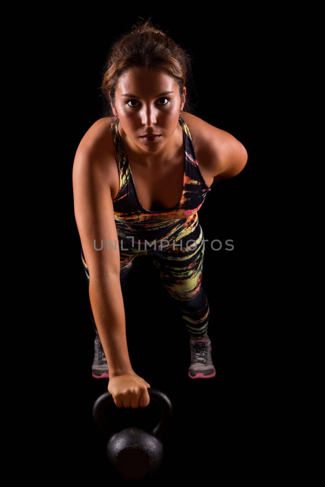 A beautiful young woman exercising - fitness concept