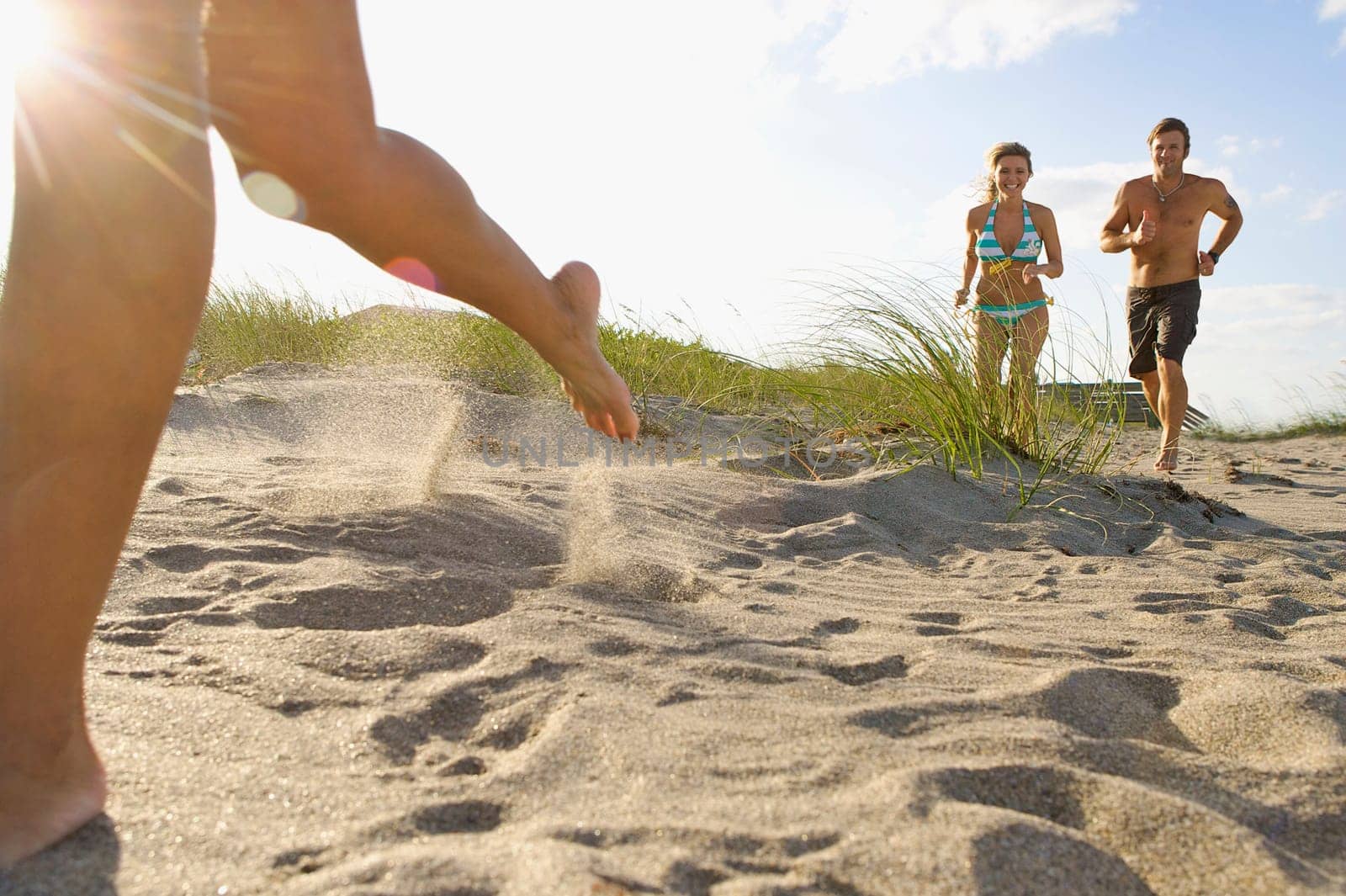 Couple running on the beach