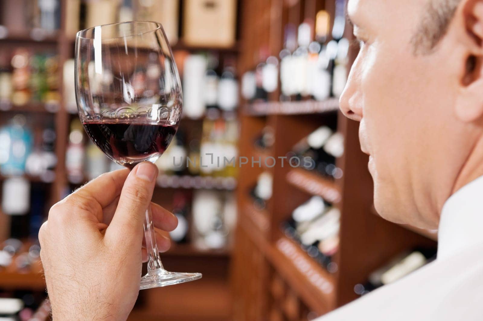 Businessman holding a wine glass