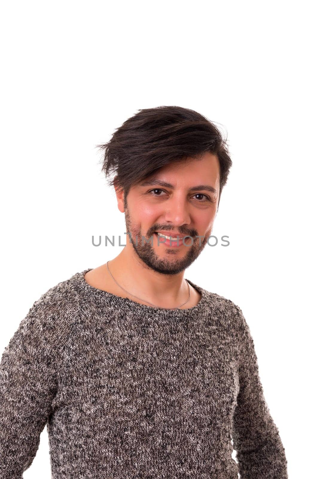 Studio picture of a young and handsome man posing isolated